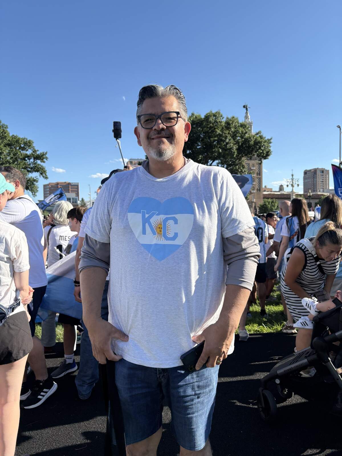 Jorge Martinez of Kansas City, Kansas, poses in his Argentina and Kansas City-themed shirt at the Argentina banderazo, a pre-game fan rally before the Tuesday World Cup game.