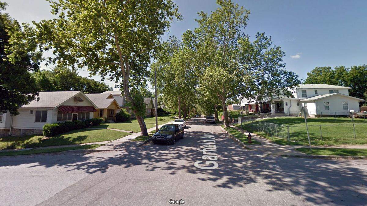 Police were investigating the city's latest homicide after a man was found shot to death early Monday in the 4000 block of Garfield Avenue in Kansas City. Police are questioning a person they believe has information about the man's death. This Google Maps Street View of the area is from June 2011.