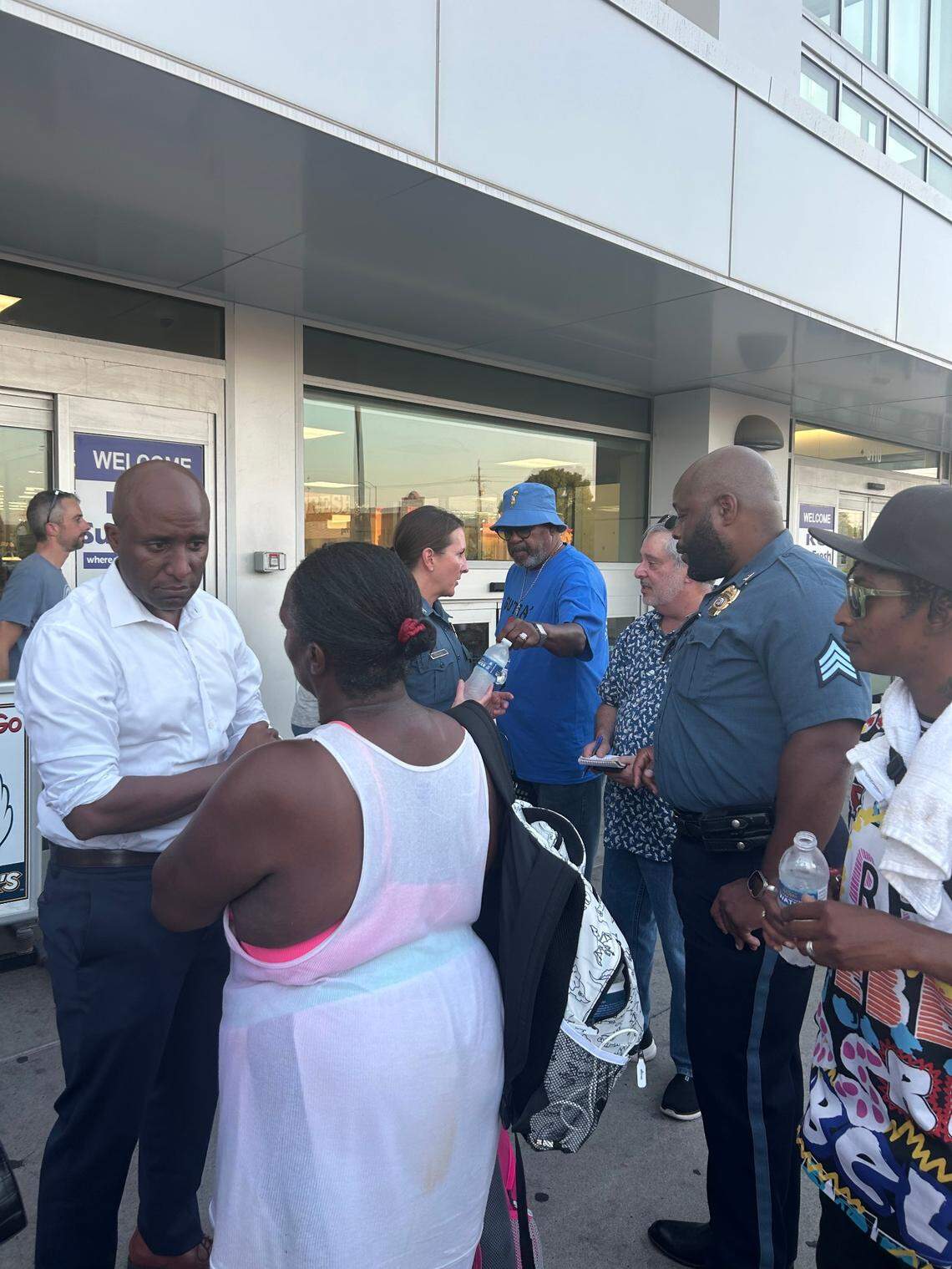 Kansas City mayor Quinton Lucas speaks with a concerned resident outside SunFresh Linwoodin September 2024 . The grocery store at 31st Street and Prospect Avenue said at the time it might close due to public safety concerns, despite a multimillion dollar investment from the city to keep it open five years ago.