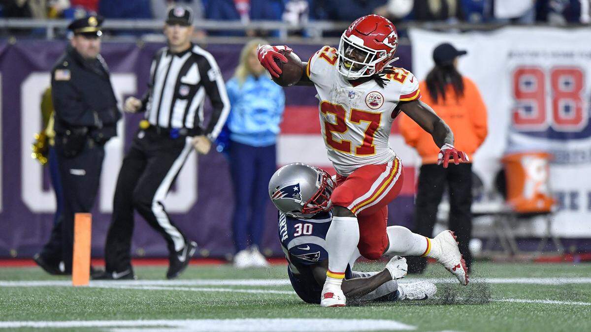 Kansas City Chiefs running back Kareem Hunt was tackled by New England Patriots cornerback Jason McCourty after Hunt crossed the goal line and scored on a 67-yard reception from quarterback Patrick Mahomes in the third quarter in Foxborough. It was Mahomes’ 15th touchdown pass of the 2018 regular season.