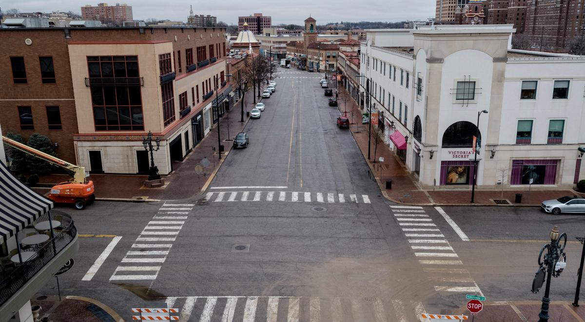 On a normal weekday the Country Club Plaza would be bustling with activity, but Wednesday it was hauntingly quiet as people continue heed advice of medical experts and civic leaders to stay at home and limit their possible exposure of COVID-19.