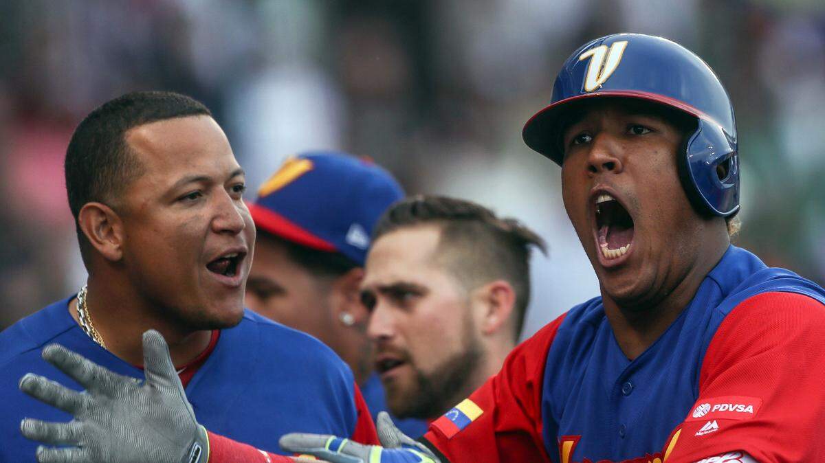 Venezuela’s Salvador Perez celebrates after a home-run in the 9th inning during a World Baseball Classic game against Italy, in Guadalajara, Mexico, Saturday, March 11, 2017. All-Star catcher Perez injured his left knee in a home-plate collision with his Kansas City Royals backup Drew Butera in a World Baseball Classic game. Venezuela rallied to beat Italy 11-10 on Martin Prado’s 10th-inning double after Butera stumbled into Perez to end the ninth with the score tied at 10.(AP Photo/Luis Gutierrez)