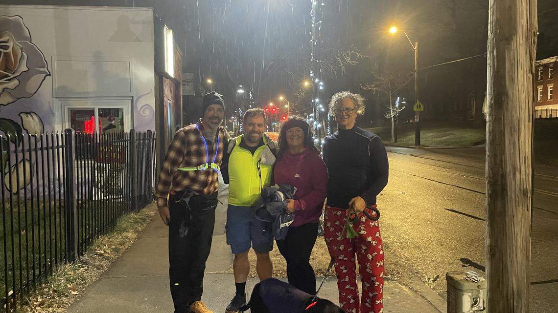 JC Van Deventer and his friends walk along 39th Street in Kansas City, Missouri, as they make their way toward Kansas City, Kansas, on the morning of Dec. 18, 2025. Van Deventer walked from his home in Lee’s Summit to KCK to raise funds for children experiencing homelessness.