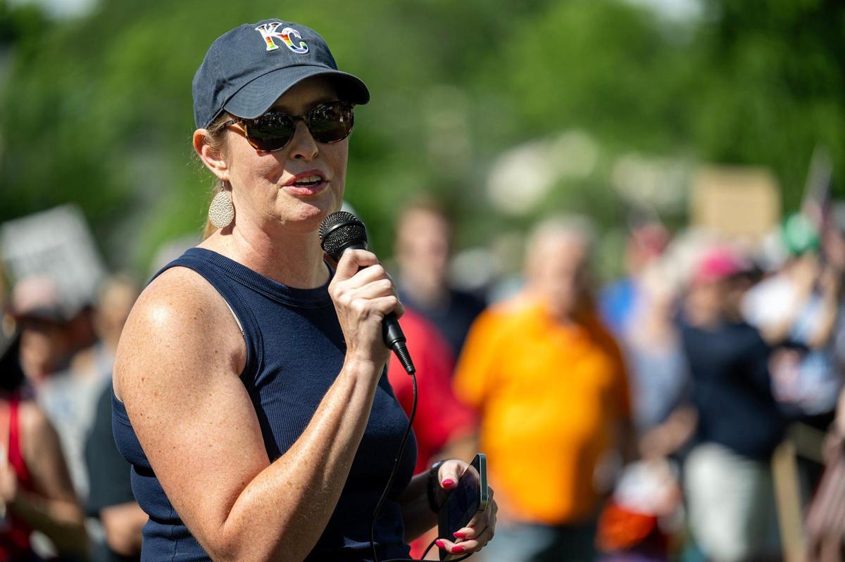 Kansas State Sen. Dinah Sykes, a Democrat, spoke to a large crowd gathered at Sar-Ko-Par Trails Park as part of a nationwide “No Kings” day of defiance on Saturday, June 14, 2025, in Lenexa, Kansas. The events protest President Donald Trump and immigration policies, among other issues.