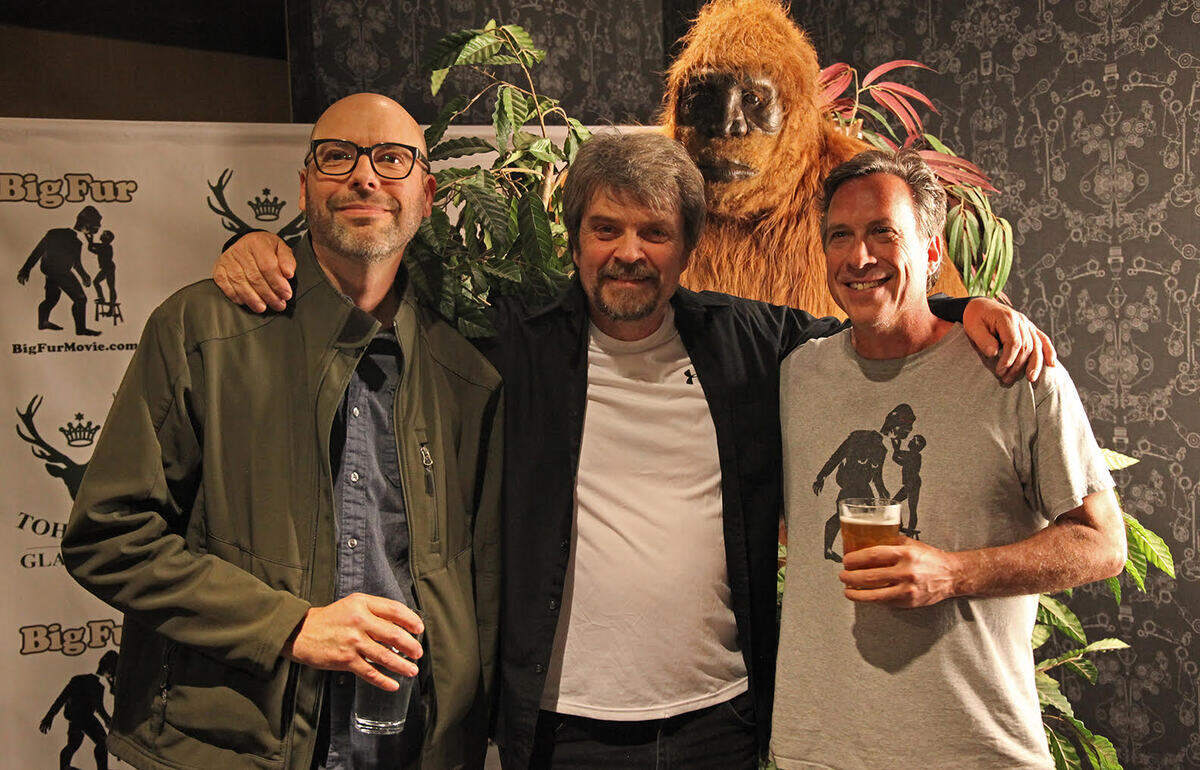 Producer Jon Niccum, left, and Kansas City filmmaker Dan Wayne, right, with the subject of their “Big Fur” documentary, Ken Walker, the Canadian taxidermist who created “Patty.”