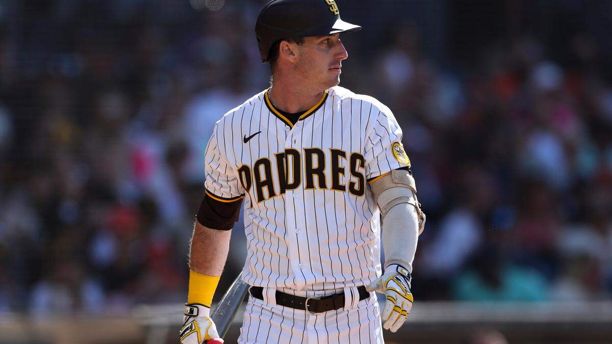San Diego Padres’ Brent Rooker walks back to the dugout after striking out in a baseball game against the San Francisco Giants, Saturday, July 9, 2022, in San Diego. (AP Photo/Derrick Tuskan)