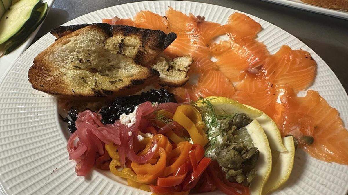 Bijou’s salmon small plate with pickled onions, sweet peppers, ricotta cheese and artisan focaccia.