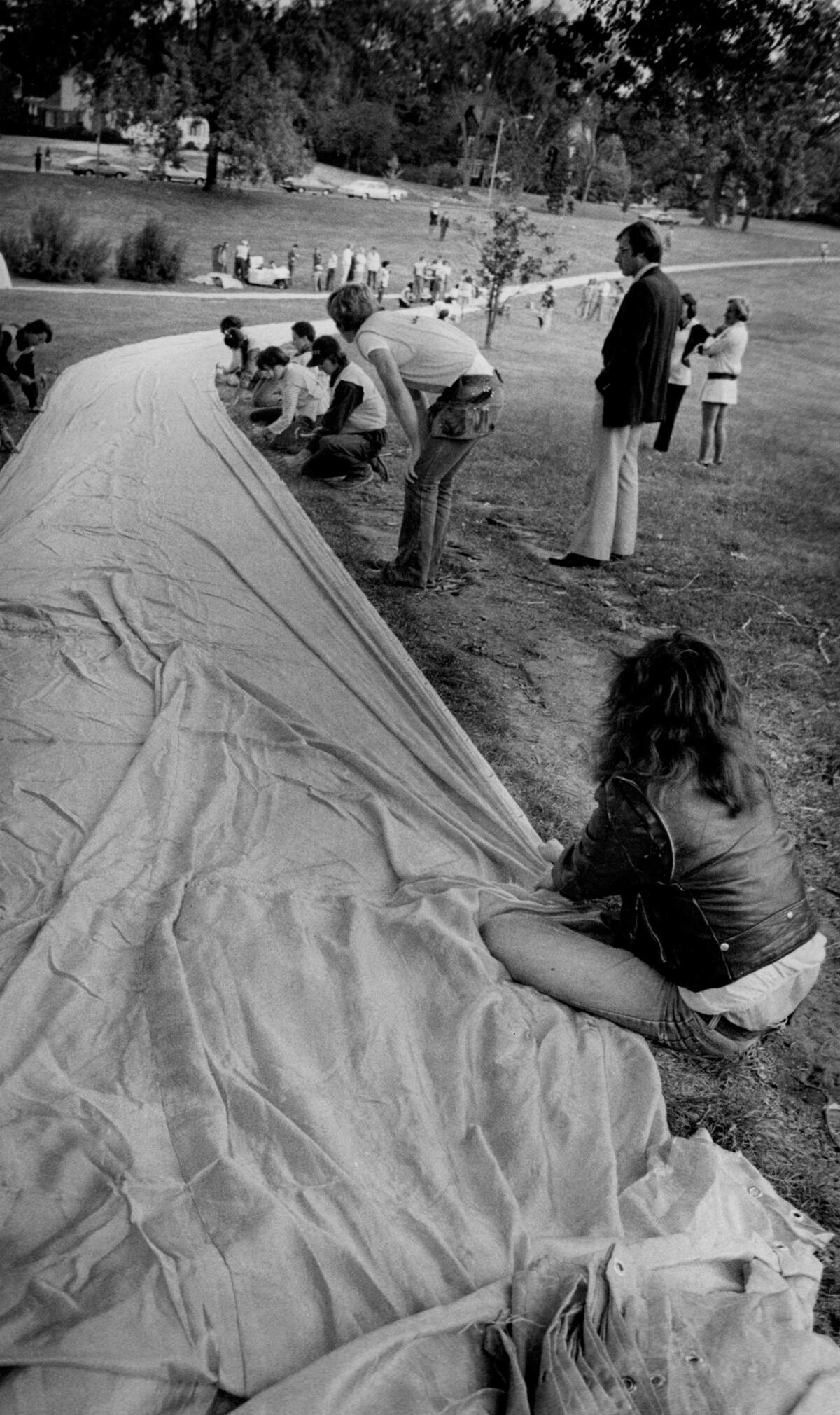 Work begins on Christo’s Loose Park art installation.