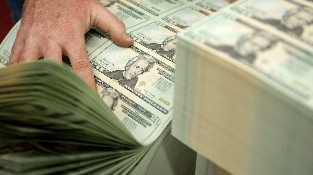 Dollar bills.