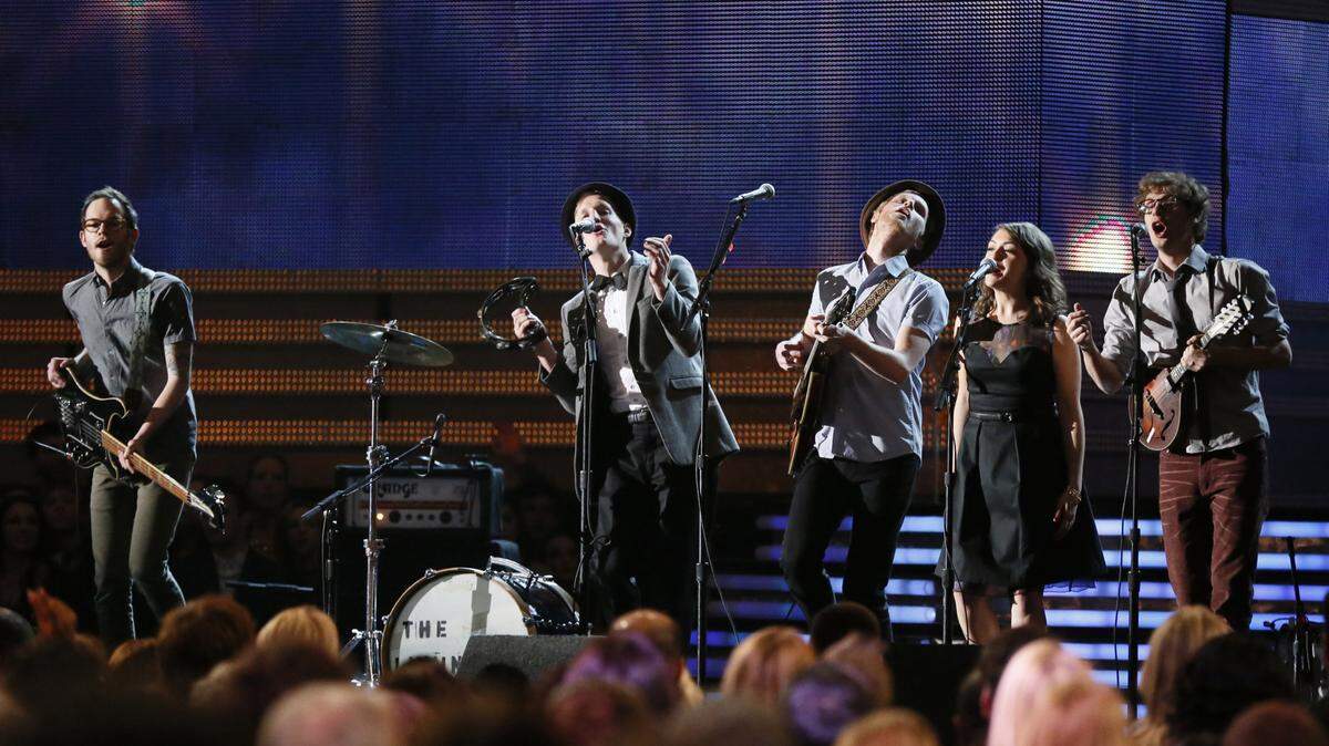 The Lumineers, seen here performing at the 2013 Grammy Awards, will next come to KC in July 2025.