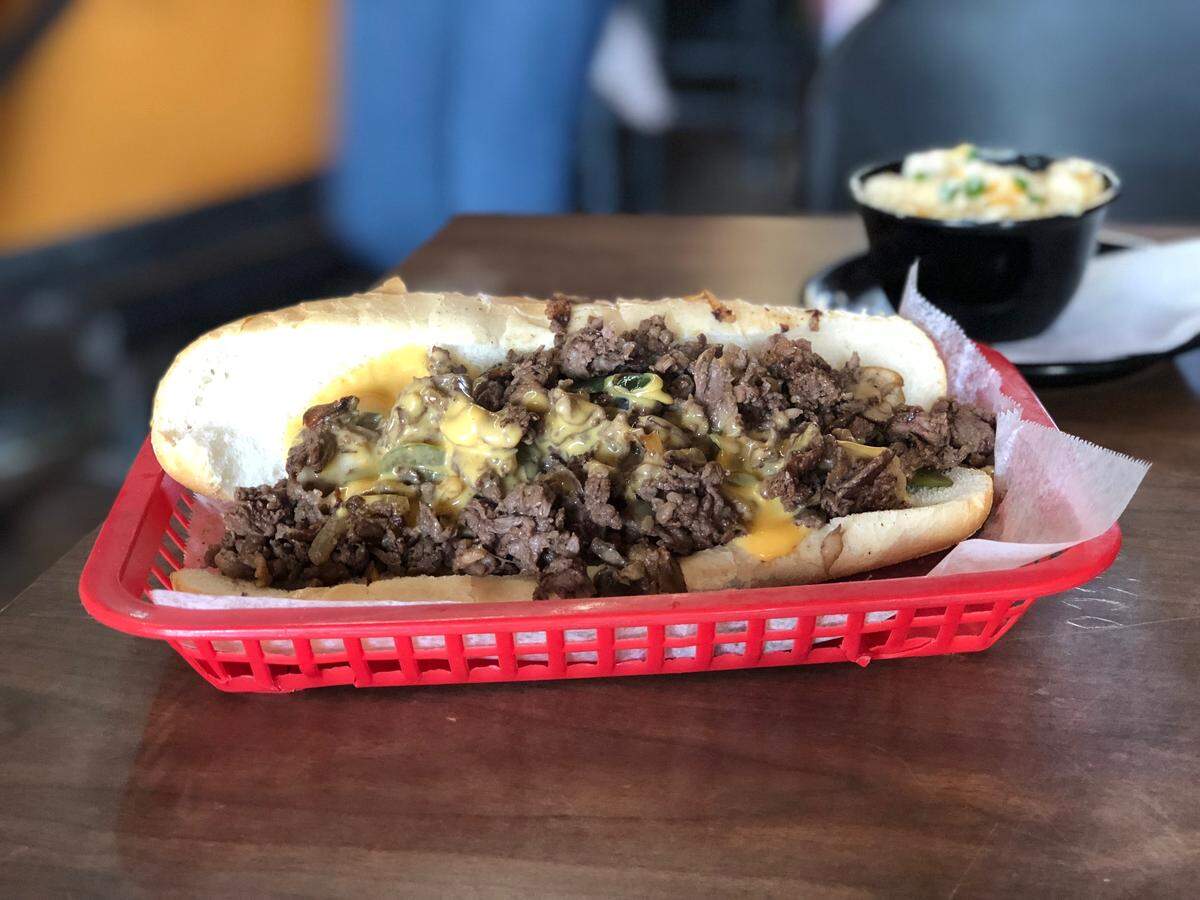 Grinders claims its South Philly cheesesteak, now called the “Chiefs” steak, is the best one west of the Mississippi River. Customers can get it with provolone or Cheez Whiz, shown here.