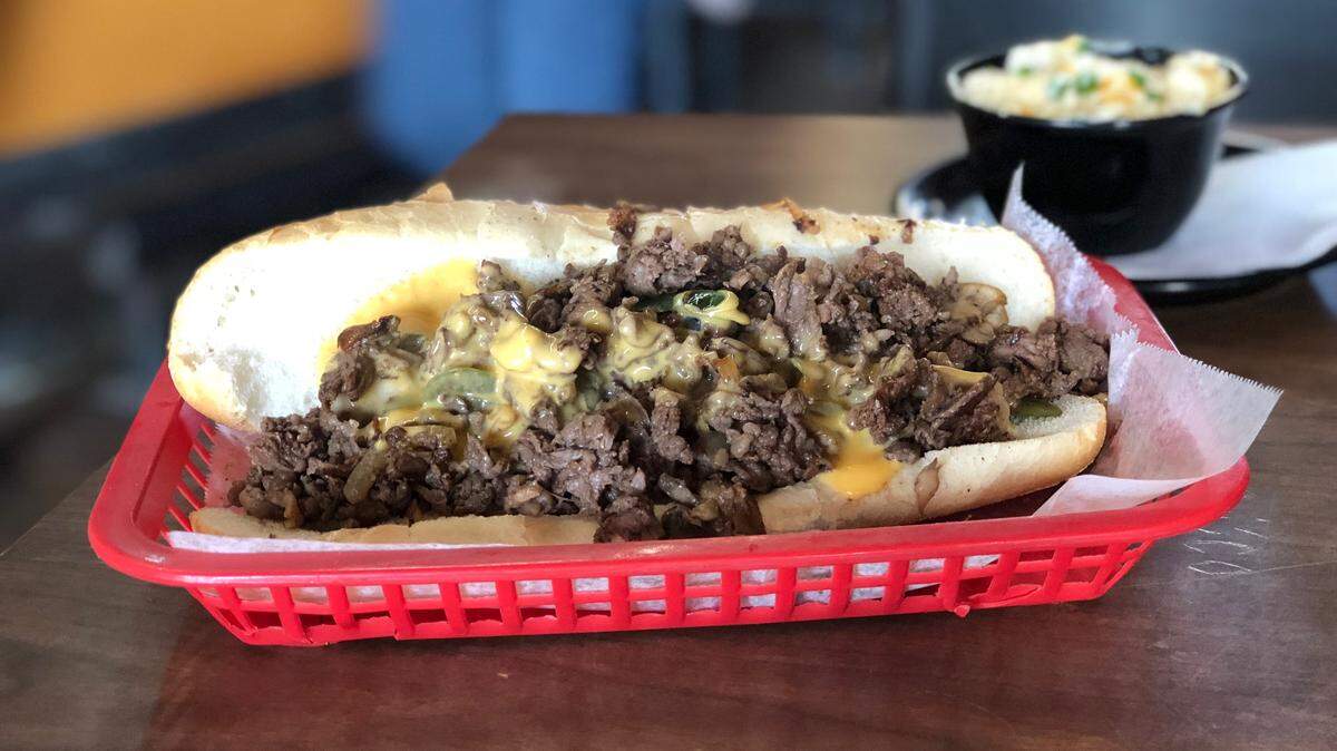 Grinders claims its South Philly cheesesteak — now referred to only as the KC Chiefsteak — is the best one west of the Mississippi River. Customers can get it with provolone or Cheez Whiz, shown here.