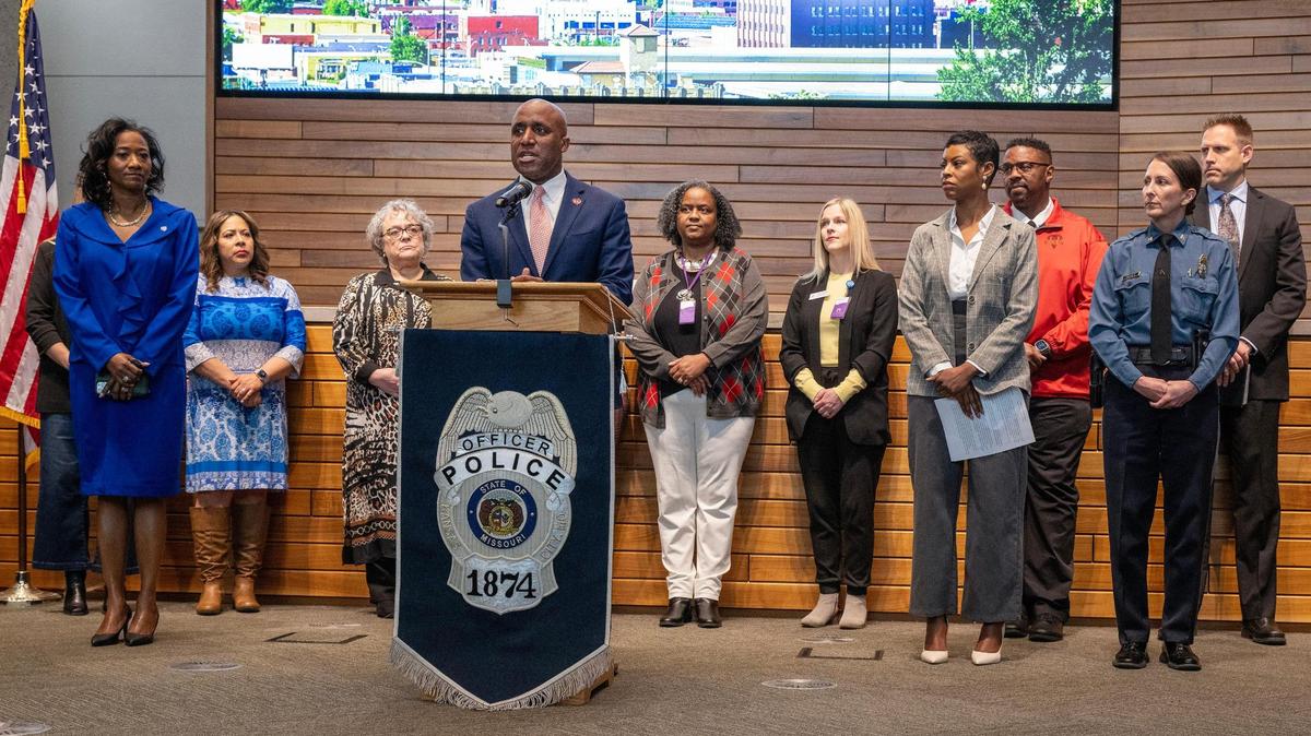 Domestic violence advocates stood with Mayor Pro Tem Ryana Parks-Shaw, left, as Mayor Quinton Lucas, center, joined Jackson County Prosecutor Melesa Johnson, second from right, Police Chief Stacey Graves, right, and others for a news conference to address the domestic violence issue on Monday, April 7, 2025, at Police Headquarters in Kansas City.