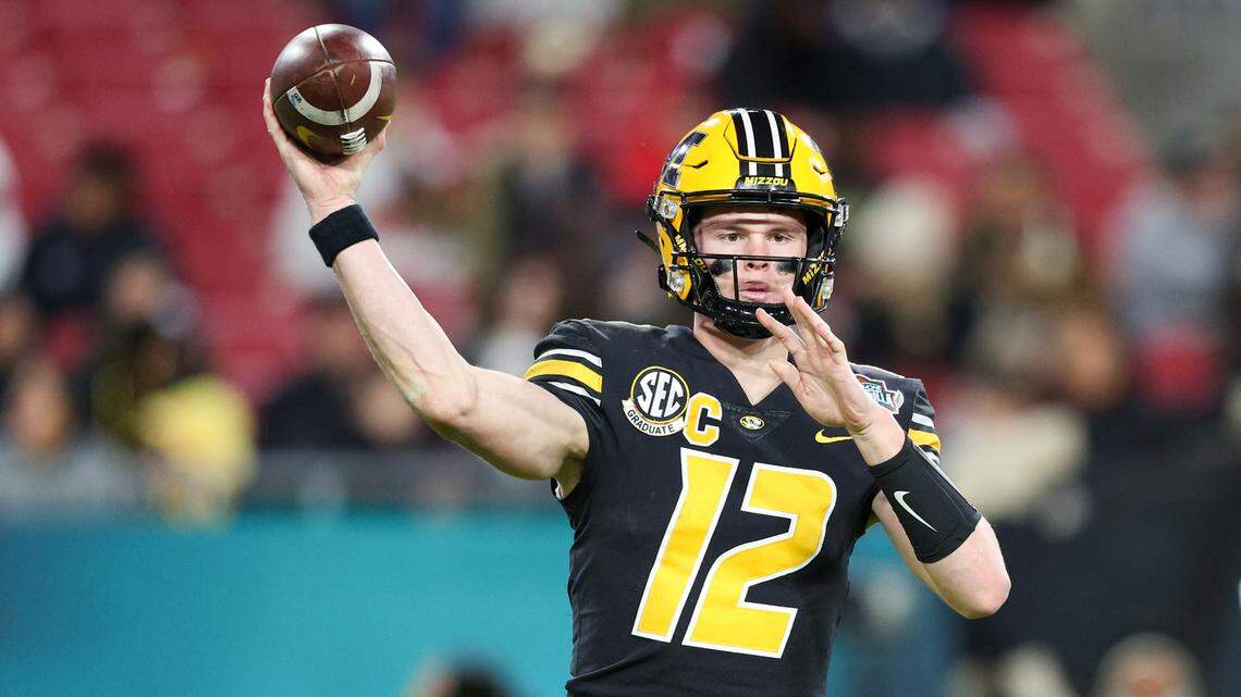 Missouri Tigers quarterback Brady Cook (12) throws a pass against the Wake Forest Demon Deacons in the third quarter in the 2022 Gasparilla Bowl at Raymond James Stadium on Dec. 23, 2022.