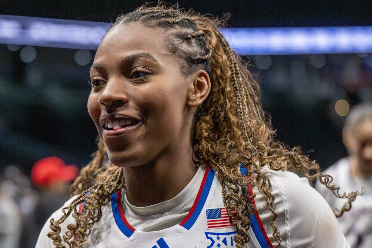Kansas Jayhawks guard S'mya Nichols sticks her tongue out while walking off the court after defeating the UCF Knights 56-35 in the Big 12 Women's Basketball Tournament at T-Mobile Center on Wednesday, March 4, 2026, in Kansas City.