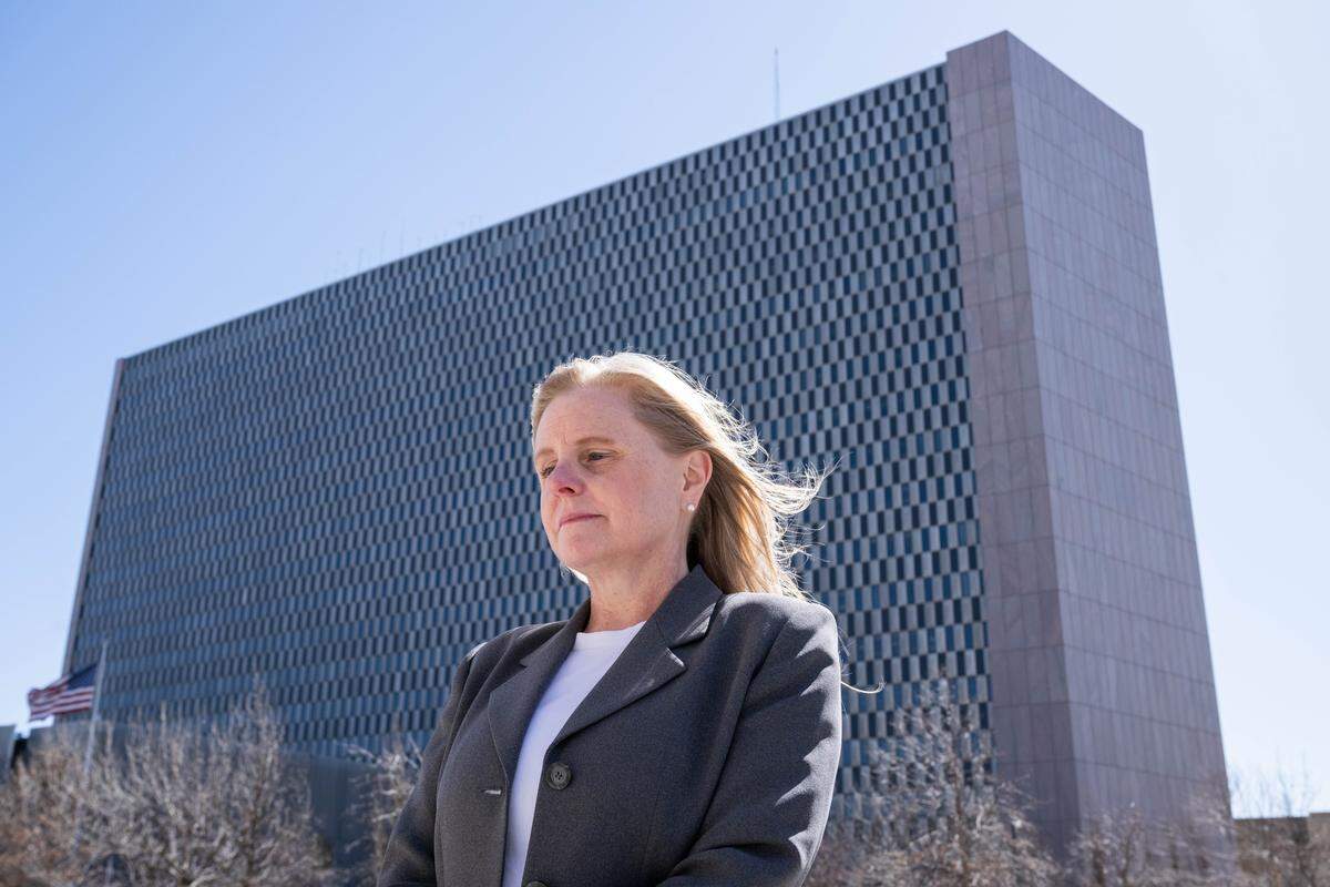 Cynthia Clark outside the Richard Bolling Federal Building in Kansas City on Monday, March 10, 2025. Clark is a Navy veteran and former federal worker who was fired as part of the DOGE job cuts. Before the U.S. Army Corps of Engineers fired her, the Kansas City resident said she knew she wanted out after receiving guidance about words and concepts no longer allowed on the Corps’ online presence. 