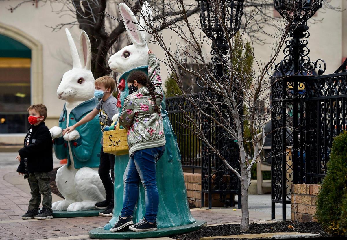 Bunnies and wonderland animals returned to the Country Club Plaza March 15. The bunnies, a tradition since the 1930s, are installed each year to officially welcome spring. (But they skipped in 2020 because of COVID-19.) Six-year-old Kai Schnelle, from left, Michael Navarrette, 10, and Luci Stone, 8, posed with Peter and Sue near the Cheesecake Factory at Wyandotte and West 47th streets. The children, all from Springfield, were in Kansas City to compete in a wrestling tournament with their Bulldogs Wrestling Club.