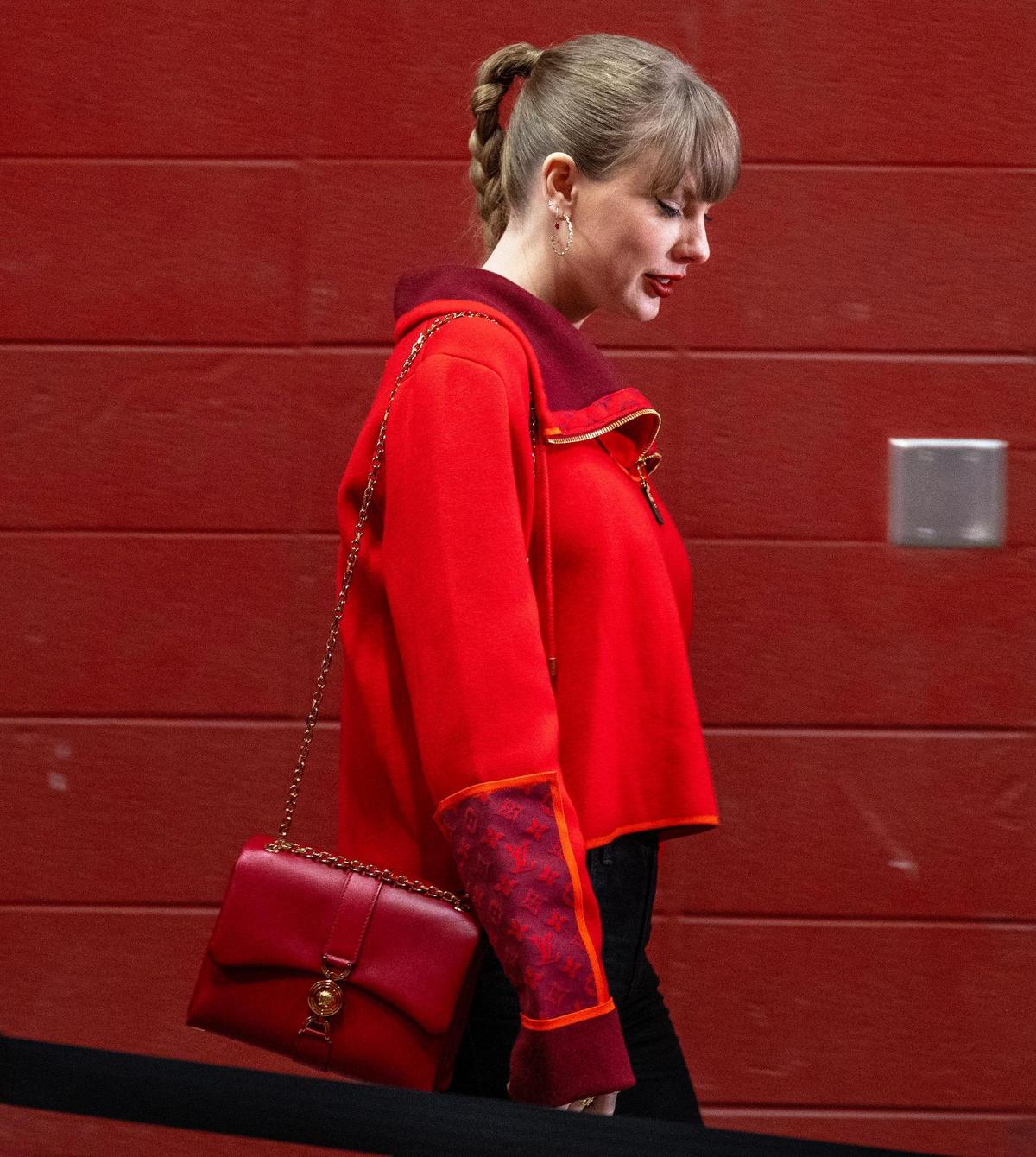 Pop star Taylor Swift walks through a tunnel to attend the Kansas City Chiefs’ game against the Las Vegas Raiders on Friday, Nov. 29, 2024, at GEHA Field at Arrowhead Stadium.