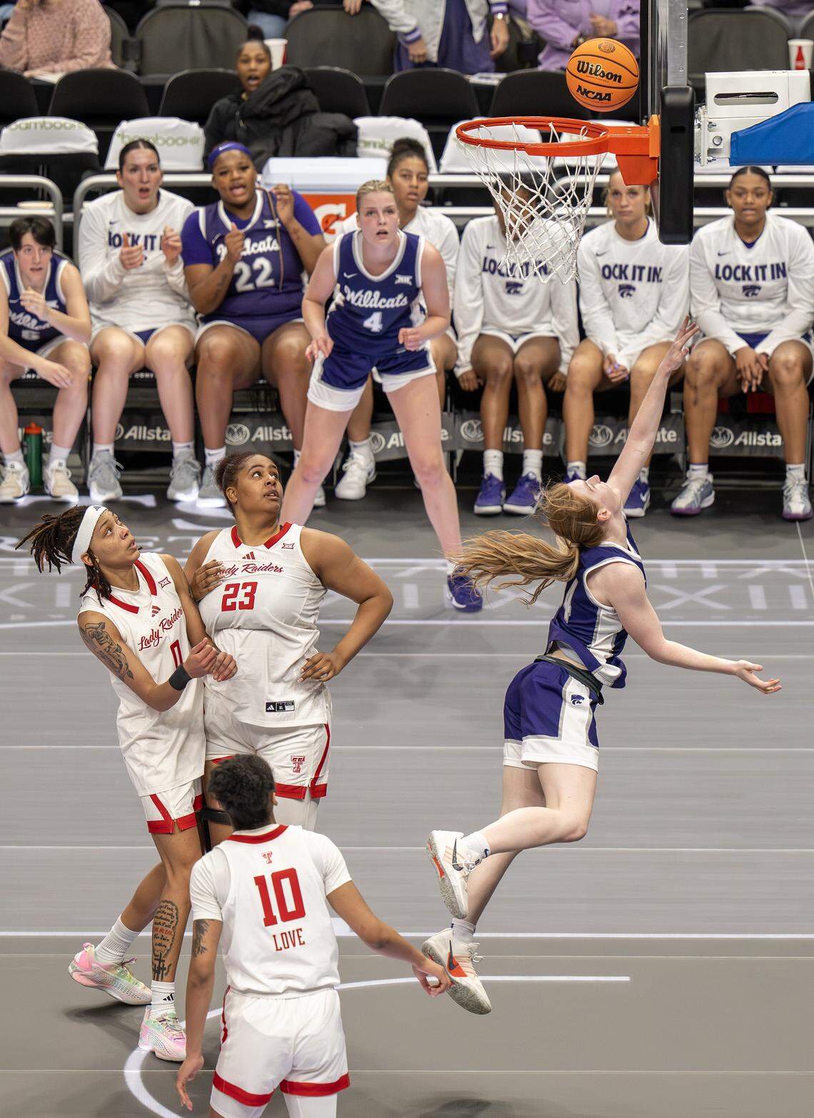 Kansas State Wildcats guard Tess Heal (34) makes a layup during the third quarter against the Texas Tech Red Raiders in the Big 12 Women's Basketball Tournament at T-Mobile Center on Thursday, March 5, 2026, in Kansas City.