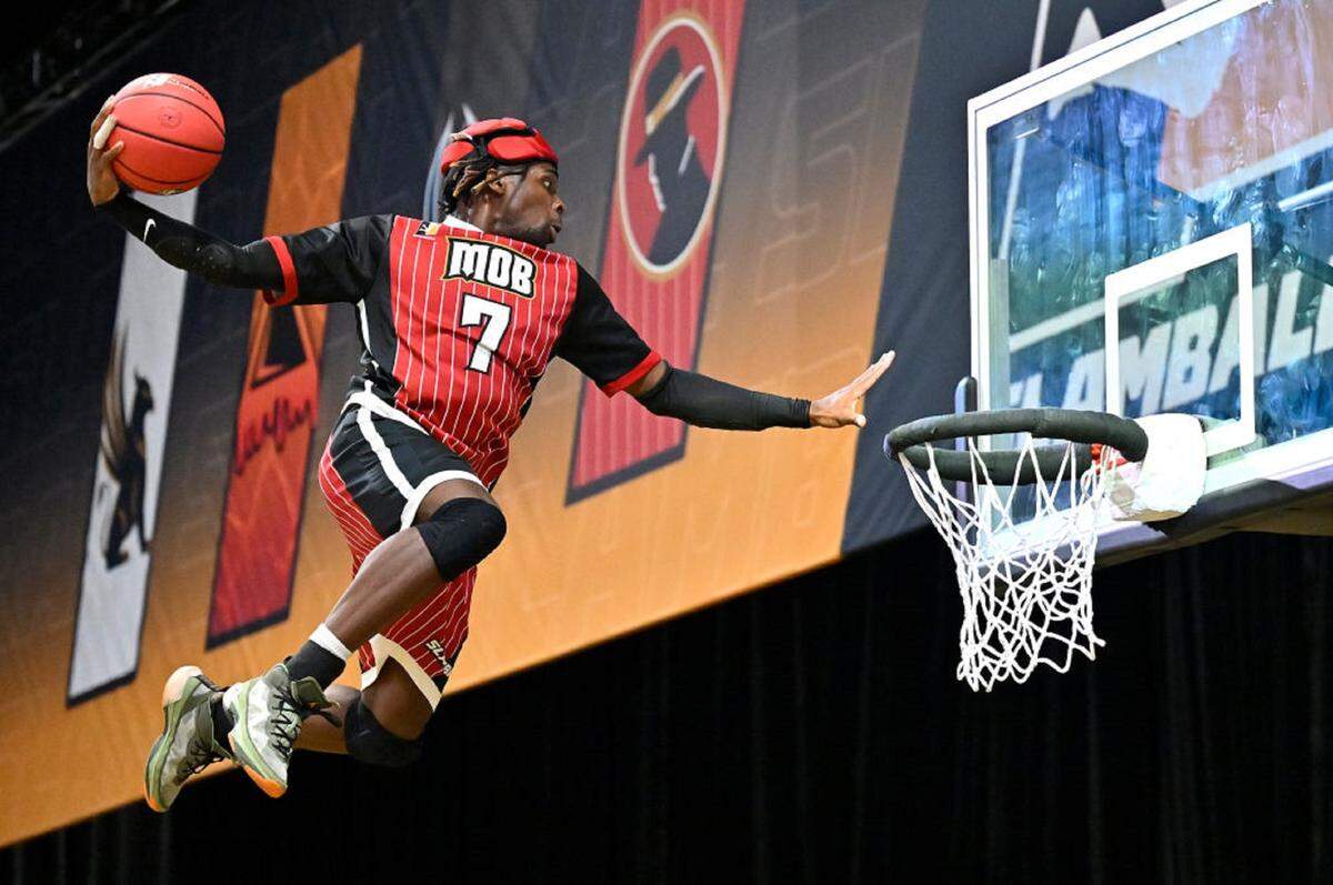 Darius Clark #7 of Mob dunks against the Slashers during a game at the Cox Pavilion on July 21, 2023 in Las Vegas, Nevada.