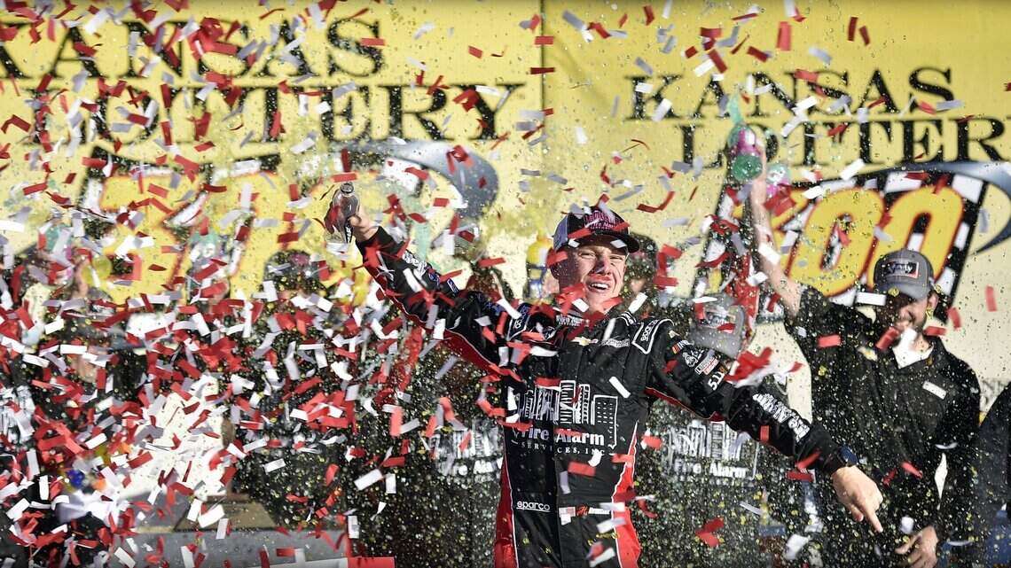Nemechek wins Friday night NASCAR trucks playoff race, ties Dad for victories at Kansas