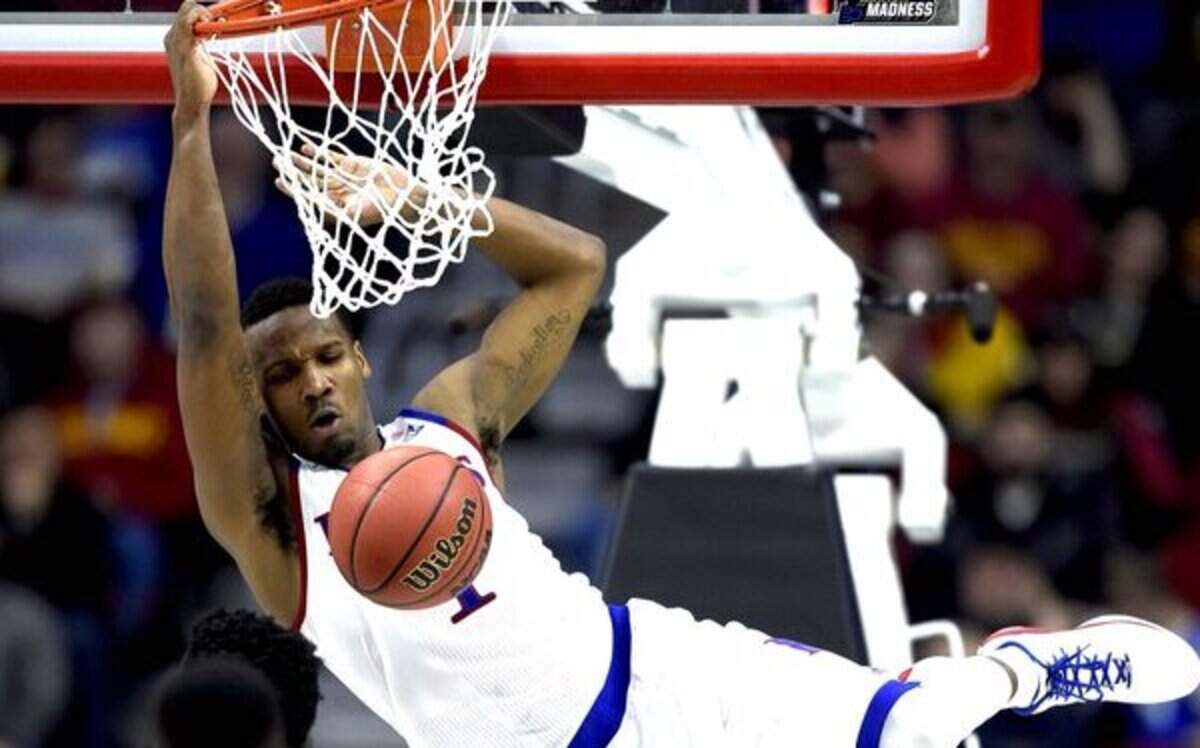 Kansas' Wayne Selden dunked in the second half as the Jayhawks played Connecticut in the NCAA Tournament on Saturday in Des Moines, Iowa.