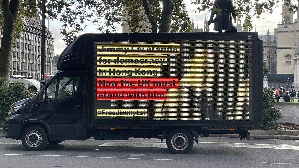 One of the three trucks that circled Parliament Square in support of Jimmy Lai