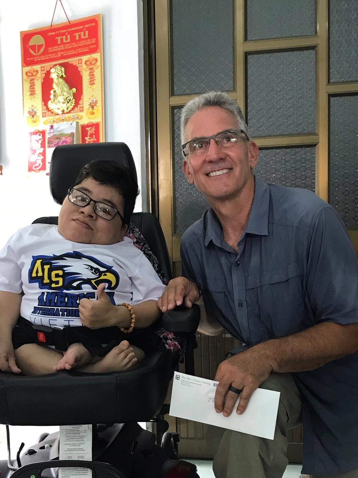Alden visits with Alden with a woman known as Thao, who was severely affected by Agent Orange and is the subject of a documentary called "Thao's Library."
