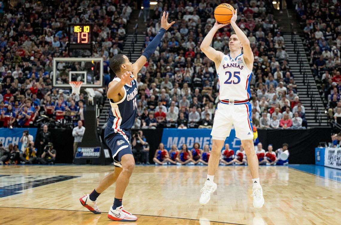 Kansas Jayhawks guard Nicolas Timberlake (25) shoots a 3-pointer over Gonzaga Bulldogs guard Nolan Hickman (11) during a men’s college basketball game in the second round of the NCAA Tournament on Saturday, March 23, 2024, in Salt Lake City, Utah.