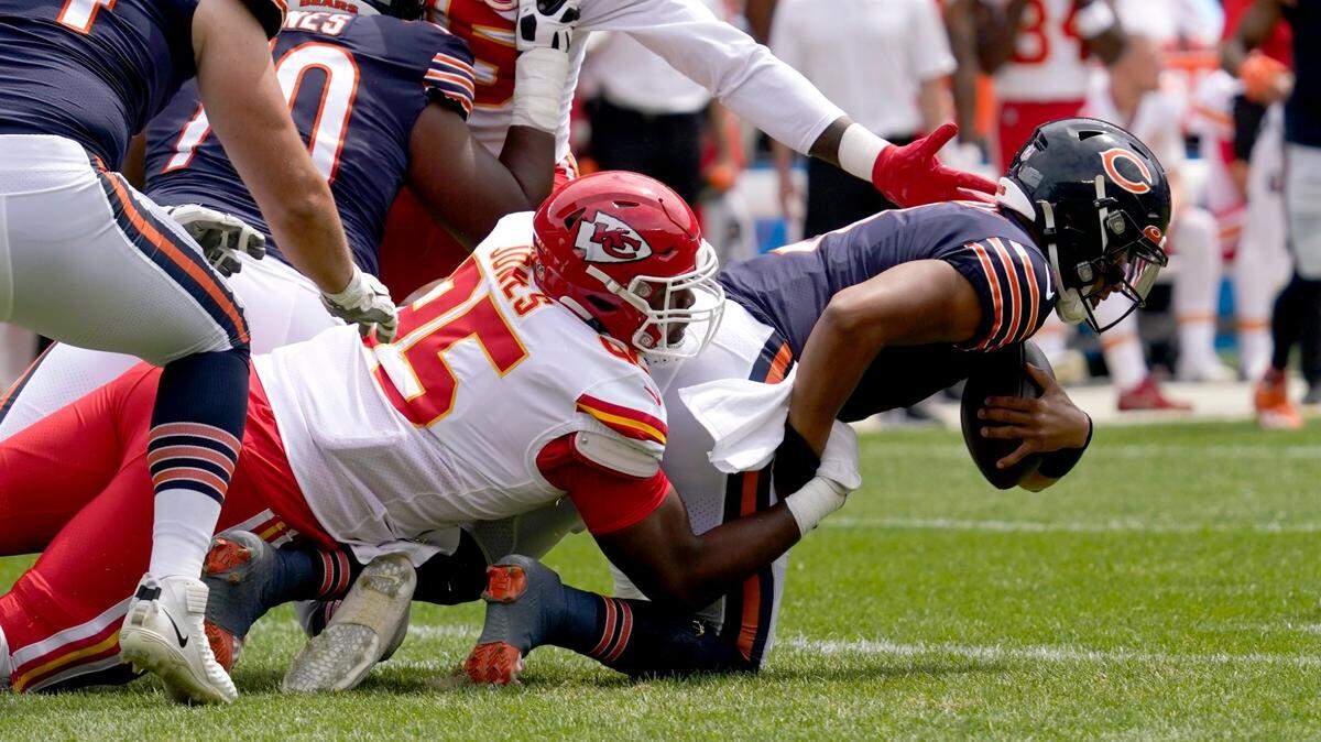 Chiefs defensive tackle Chris Jones sacks Chicago quarterback Justin Fields during Saturday’s preseason game against the Bears at Soldier Field.