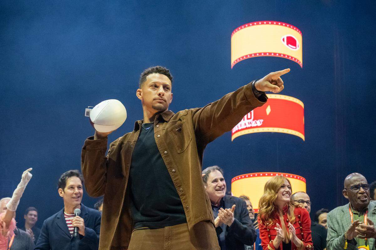 Kansas City Chiefs quarterback Patrick Mahomes prepares to give away a signed football at the Big Slick fundraiser on Saturday, May 30, at T-Mobile Center. The annual fundraiser put on by famous Kansas City celebrities raises money for Children’s Mercy Hospital.