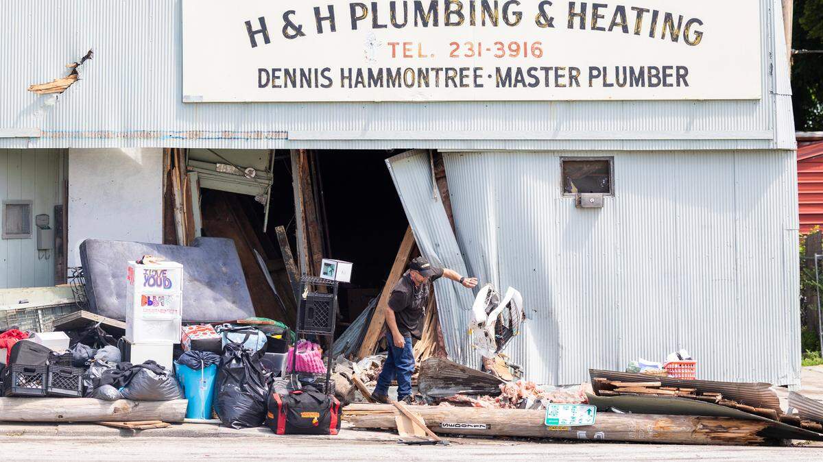 An old building in the 4800 block of East 9th Street was heavily damaged when a vehicle crashed into it Thursday evening. Cleanup efforts were underway at the building on Friday.