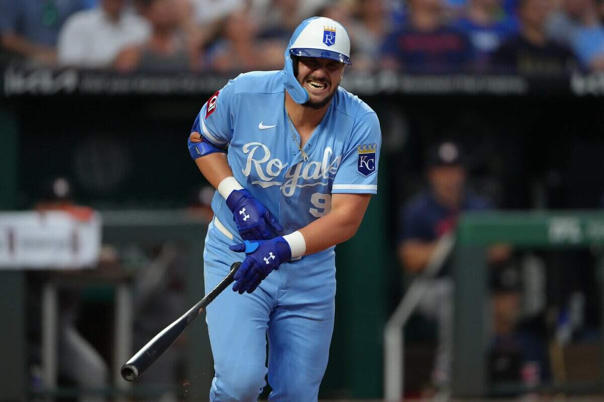 KANSAS CITY, MISSOURI - JUNE 13: Vinnie Pasquantino #9 of the Kansas City Royals reacts as he injuries himself while pop flying out in the fifth inning against the Houston Astros at Kauffman Stadium on June 13, 2026 in Kansas City, Missouri. (Photo by Ed Zurga/Getty Images)