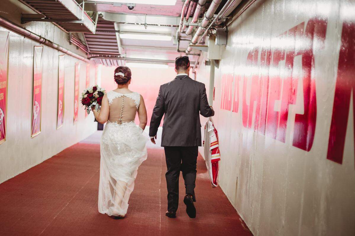 The tunnel of love: Kelli and Anthony Gascich of the Northland got married at Arrowhead Stadium in 2019 and got to take wedding pictures in various places around the stadium, including the locker room.