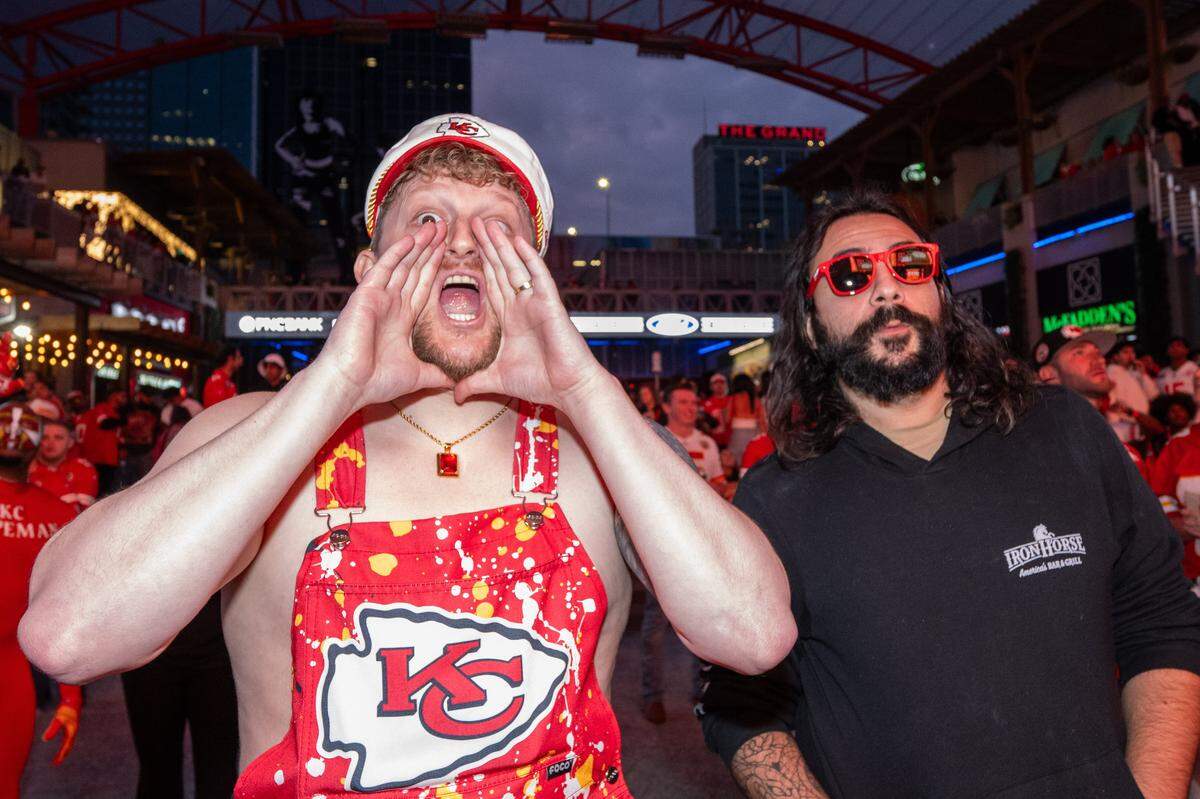 Sean Gleason and Caleb Geronimo react to a play during the Chiefs season opening game vs. the Los Angeles Chargers, at the KC Live! watch party on Friday, Sept. 5, in Kansas City’s Power and Light District.