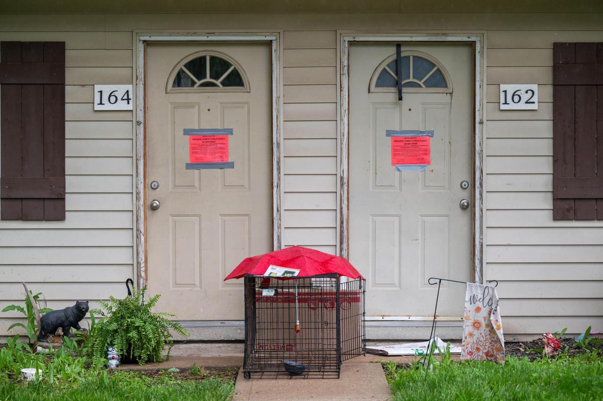 Warning signs were posted on doors at Aspen Place Apartments in Gardner on Wednesday, May 7, 2025. Residents of the apartment complex were forced from their homes after the city condemned the property due to several safety concerns including consistent water main damage, causing the water to be shut off for days.