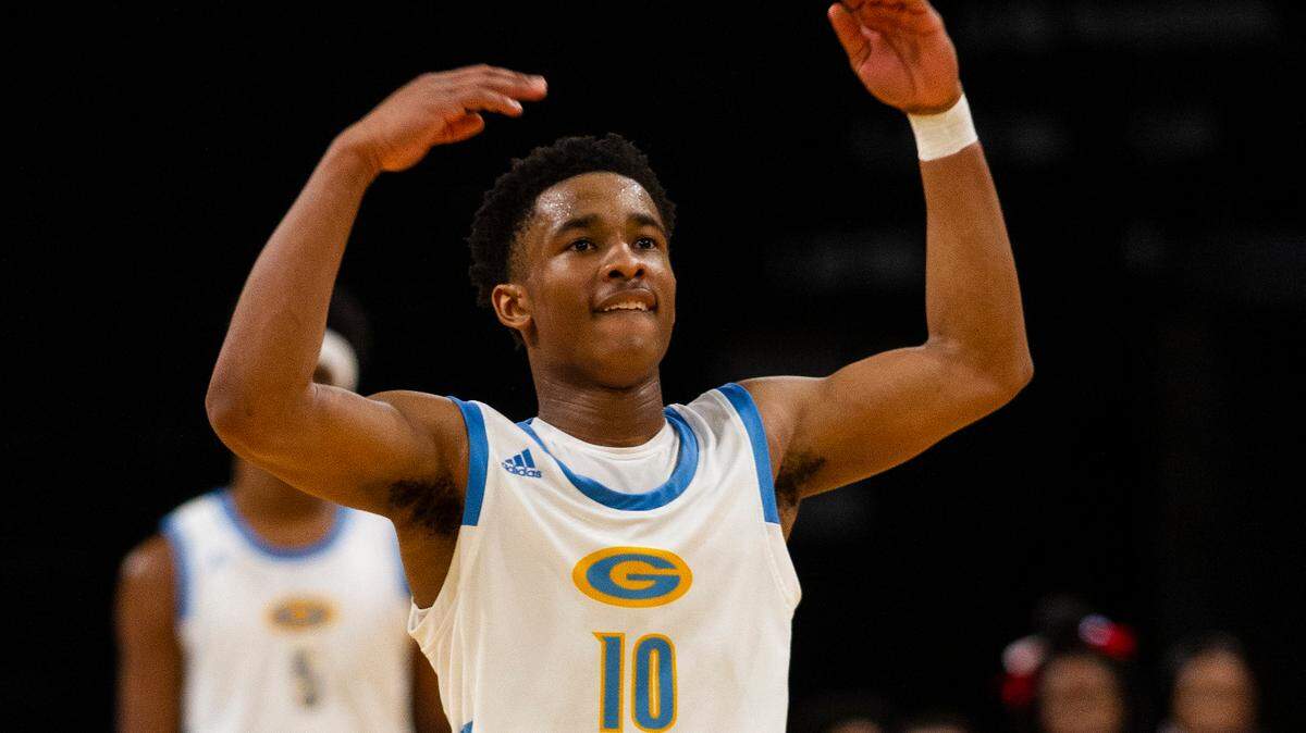 Deandre Sorrells of Grandview reacts after giving Grandview a more comfortable lead late in Saturday’s game against Southeast at Silverstein Eye Centers Arena. Powered by Sorrells, the Bulldogs clinched a spot in the Class 4 semifinals with a 69-61 win over the Knights.