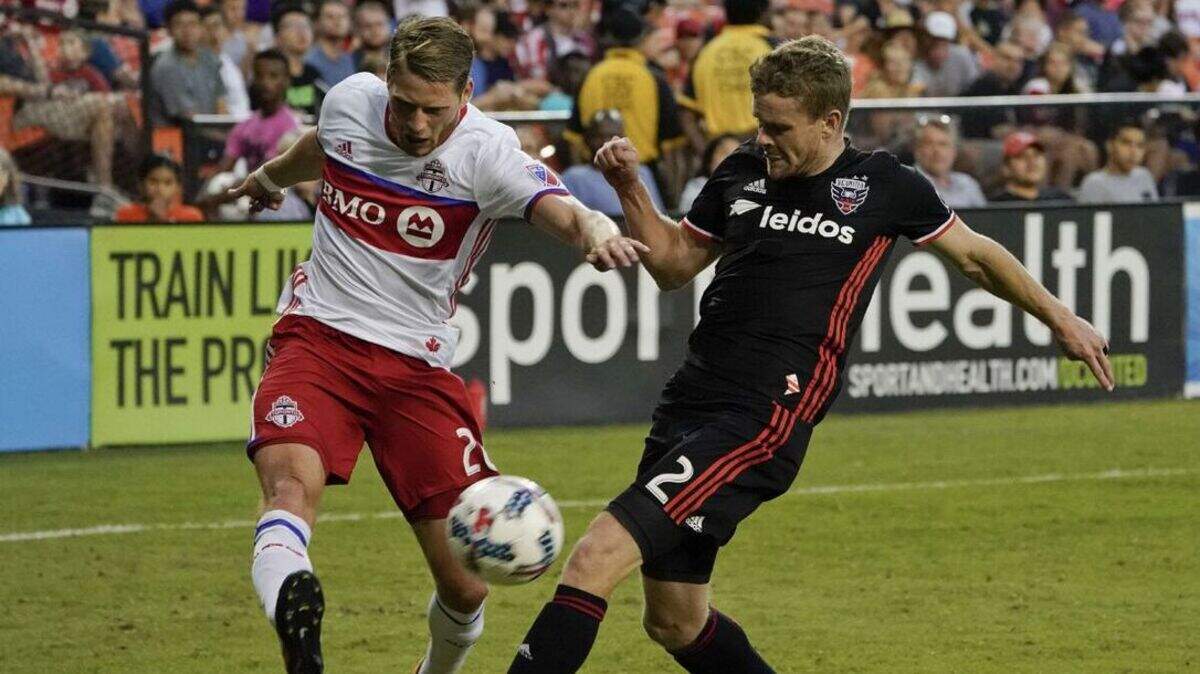 Sporting KC signed 27-year-old right back Nicolas Hasler, left.