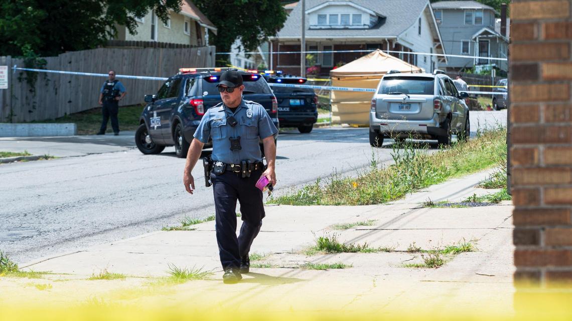Police officers block off the street to investigate a fatal shooting that left one person dead near the corner of 43rd Street and College Avenue on Friday, June 30, 2023, in Kansas City. The fatal shooting occurred near Klymax Lounge where another deadly shooting occurred in May leaving three people dead and two injured.