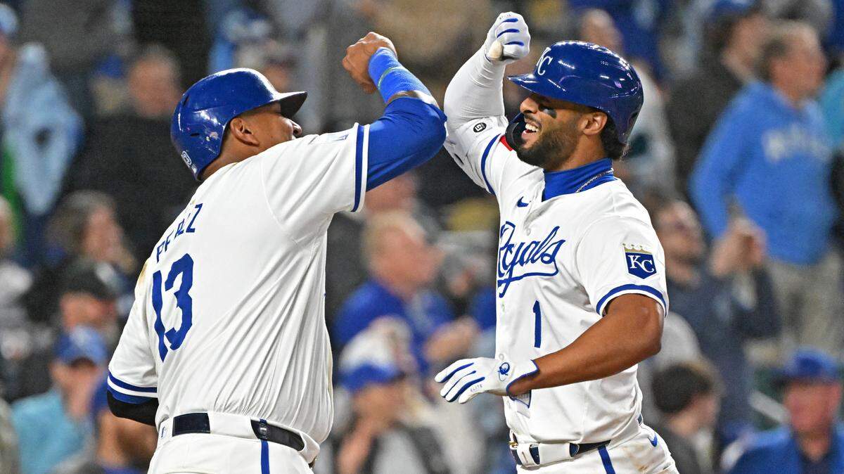 Kansas City Royals left fielder MJ Melendez (1) celebrates with teammate Salvador Perez (13) after hitting a two-run home run in the seventh inning against the Chicago White Sox at Kauffman Stadium on April 4, 2024.