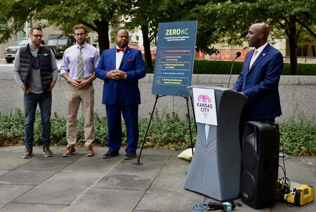 Kansas City Mayor Quinton Lucas presents the city’s new strategic plan to end homelessness, called Zero KC, outside City Hall on Thursday, Sept. 22, 2022. Houseless prevention coordinator Josh Henges, city manager Brian Platt and public works director Michael Shaw stands nearby.