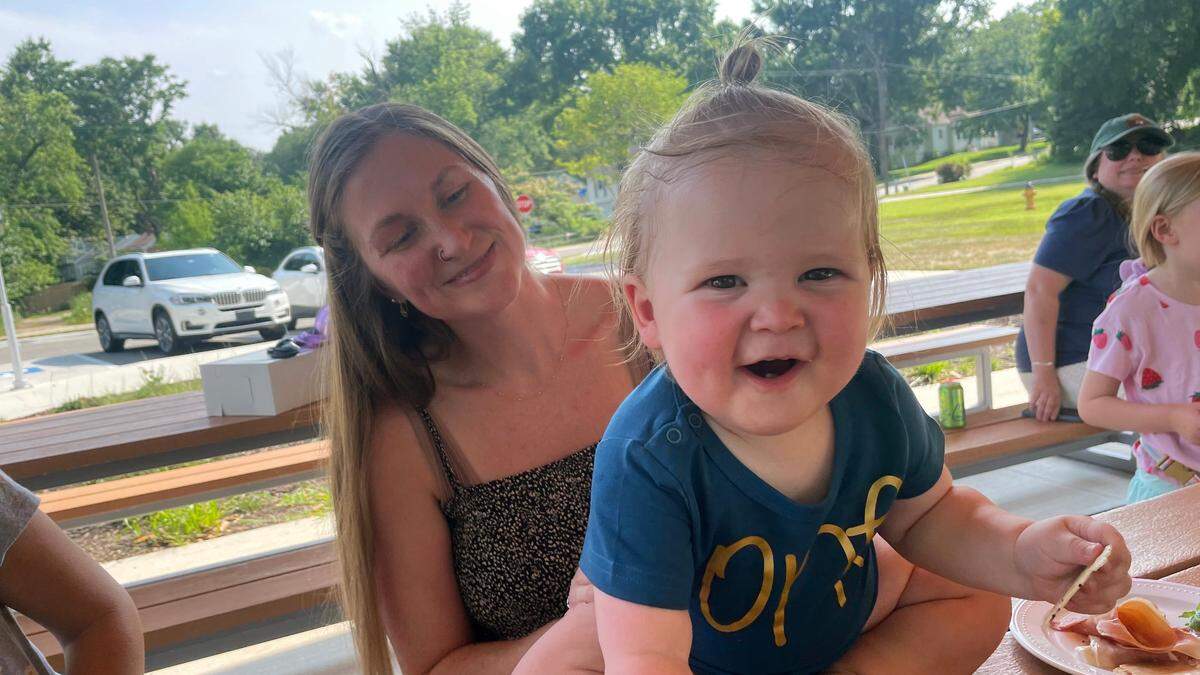 Sarah Goble holds son Finnik.