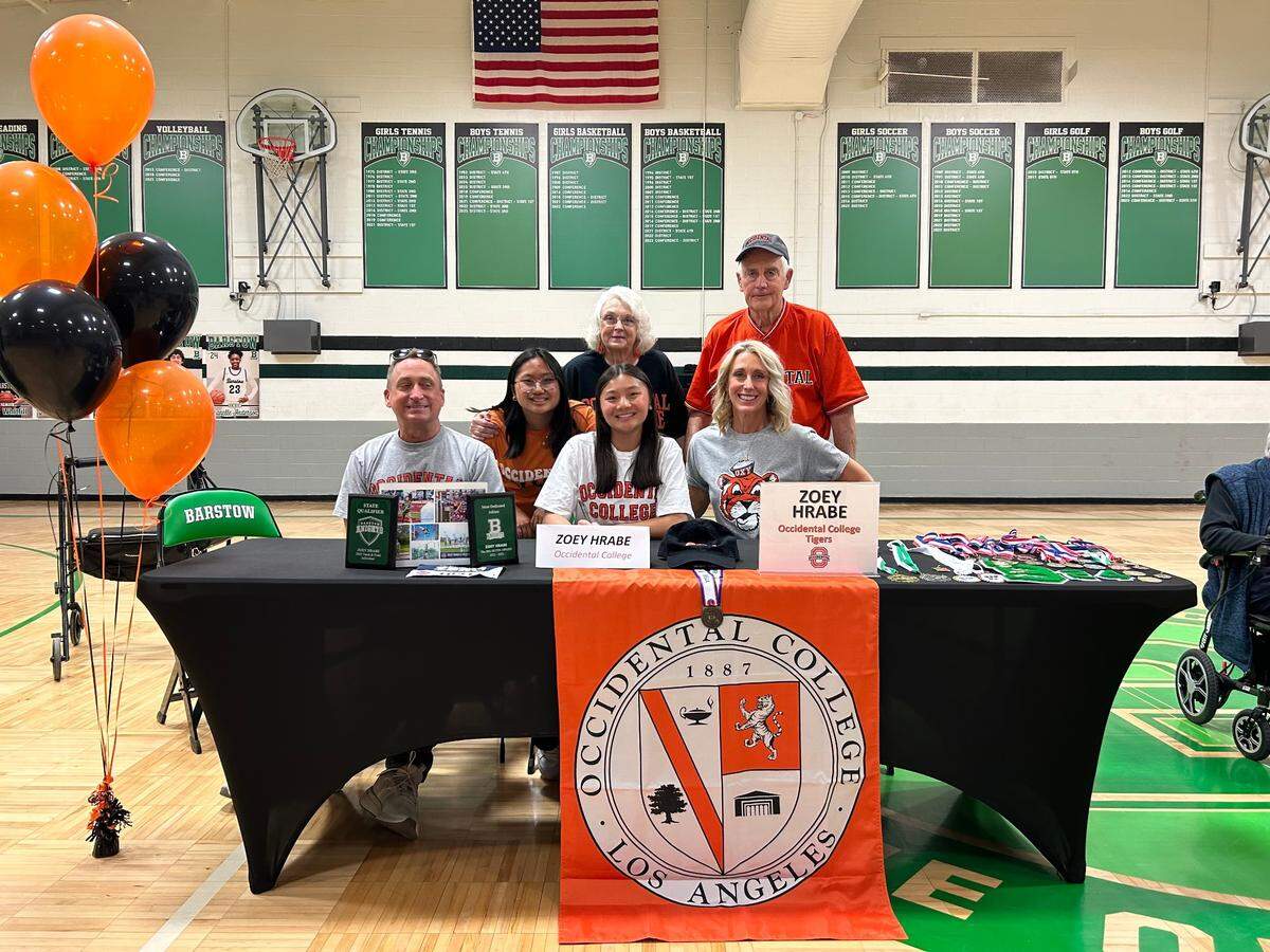 Zoey Hrabe (middle) is headed to Occidental College in Los Angeles, where she’ll continue to participate in the pole vault.