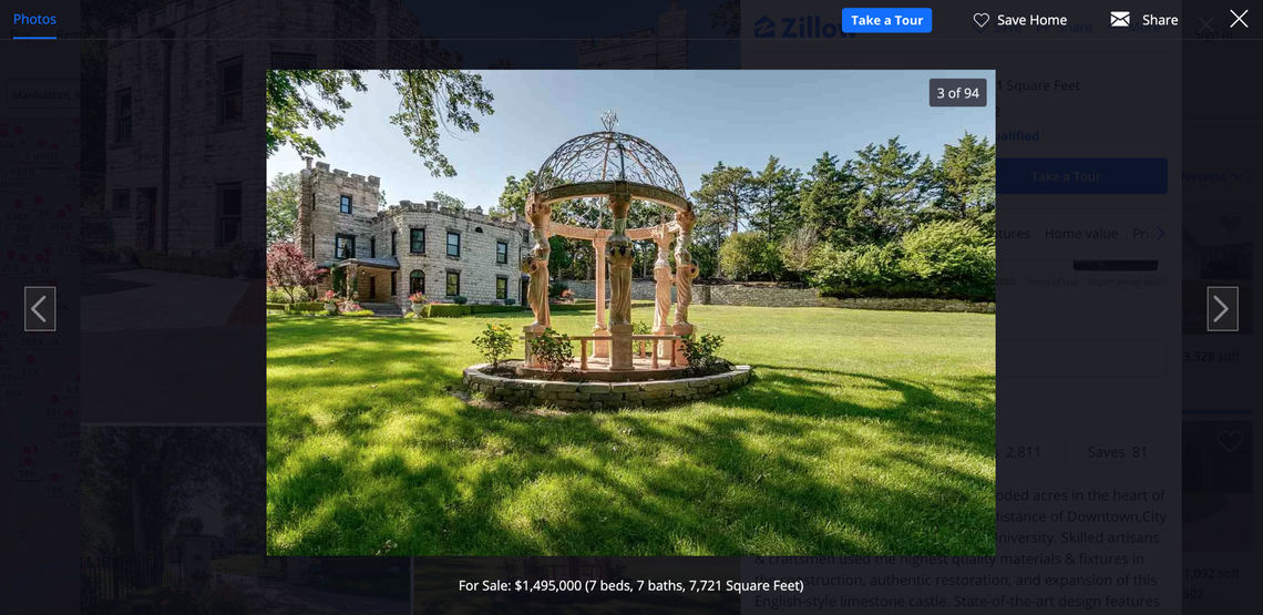 The home features outdoor statues and decor.