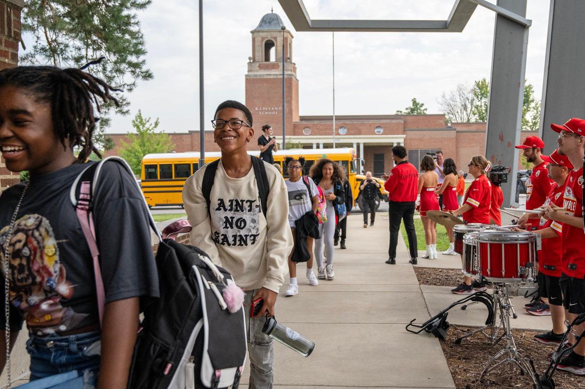 Kansas City Chiefs Rumble team welcomes students to the first day of school at Central Middle School on Monday, Aug. 19, 2024, in Kansas City.