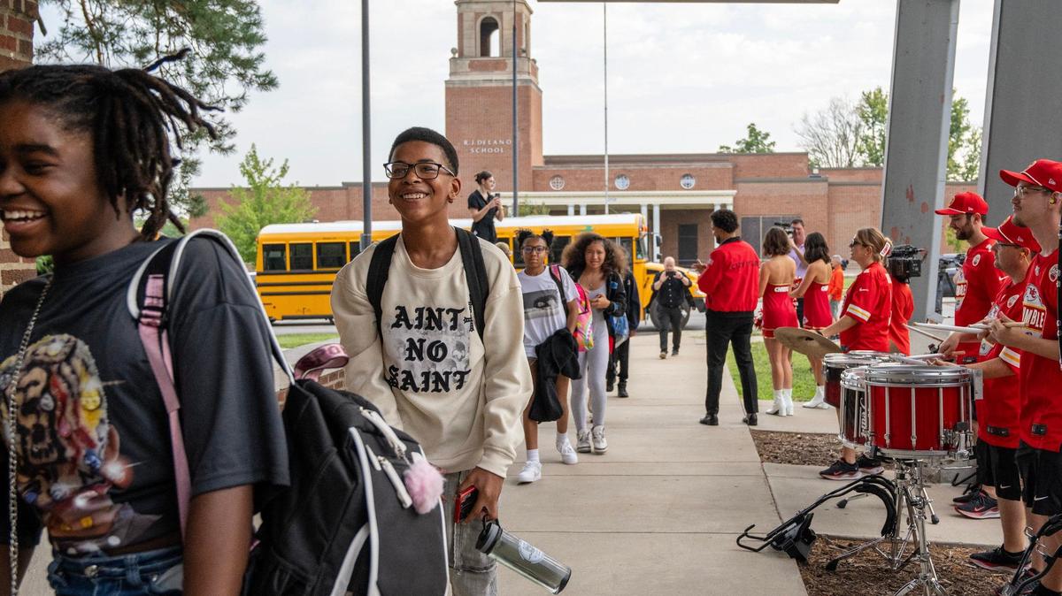 Kansas City Chiefs Rumble team welcomes students to the first day of school at Central Middle School on Monday, Aug. 19, 2024, in Kansas City.