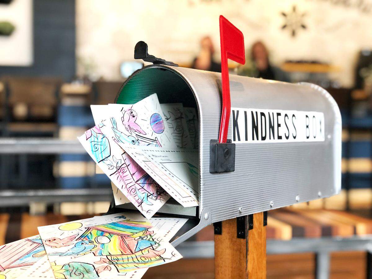 Children can write a note on a HomeGrown postcard, drop it in the Kindness Box, and HomeGrown will mail it for them.