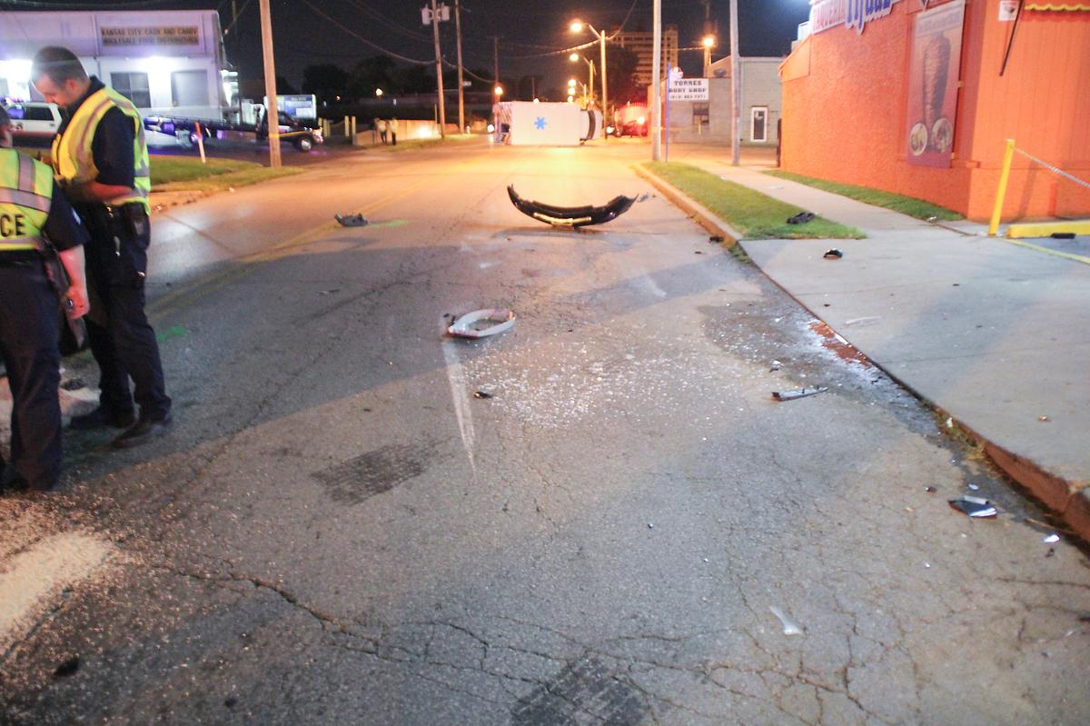 A Kansas City ambulance lies on its side after being struck by a Jackson County sheriff’s deputy who was chasing a driver in August 2017.