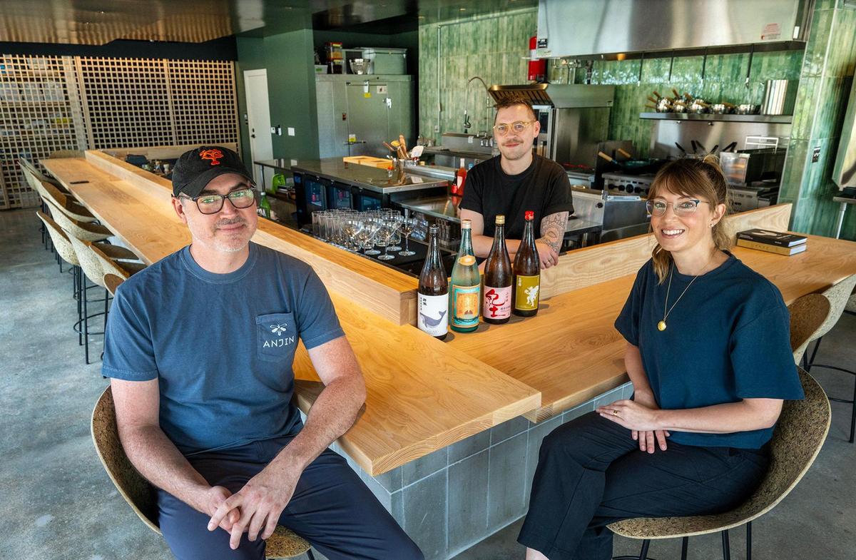 Anjin, a Japanese bar and restaurant, 1708 Oak St., is opening in July from the Nick, left, and Leslie Goellner, right, founders of the Antler Room. Drew Little, center is a partner in the restaurant.