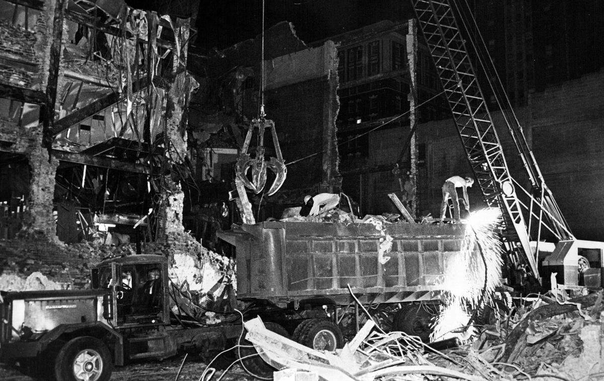 Workmen labored through the night demolishing buildings north of the Towne Theater on Main between 11th and 12th Streets in 1972. The area, called Block 92, was determined to be blighted and a 32-story office building was approved for the site by the Urban Renewal agency and the Land Clearance for Redevelopment Authority. The block once was a center of theater night life.